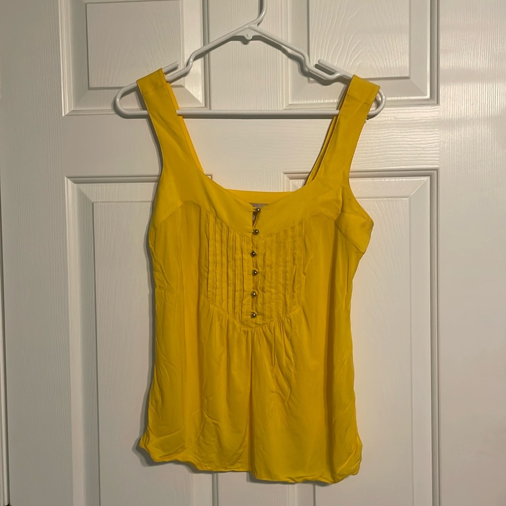 Yellow Banana Republic tank top.